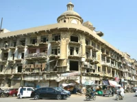 an old building in karachi downtown area photo express