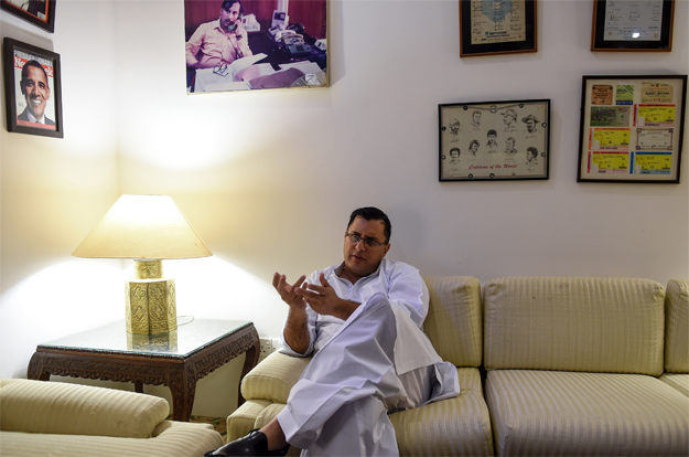  Pakistani police officer and crime stories writer Omar Shahid Hamid gestures as he speaks during an interview with AFP in Karachi. - Personal tragedy haunts the hard-boiled novels that are turning top cop Omar Shahid Hamid into one of Pakistan's most popular English-language authors. 