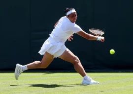 tunisia s ons jabeur in action during her first round match against bulgaria s viktoriya tomova at wimbledon 2025 photo reuters