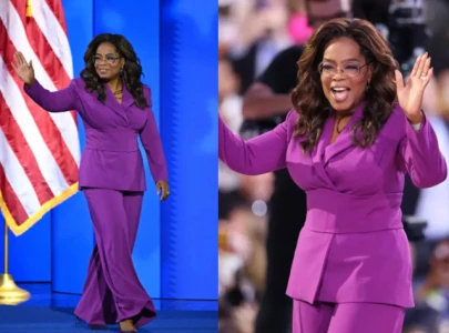 oprah winfrey s purple suit at dnc 2024 carries a hidden meaning