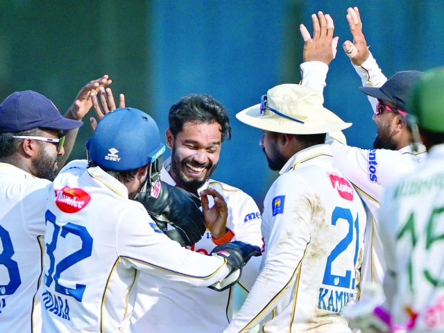 sri lanka s captain dhananjaya de silva c celebrates with teammates after taking the wicket of bangladesh s captain najmul hossain shanto in the second test in colombo on friday photo afp sri lanka s captain dhananjaya de silva c celebrates with teammates after taking the wicket of bangladesh s captain najmul hossain shanto in the second test in colombo on friday photo afp