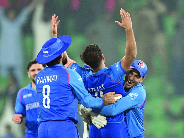 afghanistan players celebrate after beating england in the key icc champions trophy match at lahore on wednesday photo afp afghanistan players celebrate after beating england in the key icc champions trophy match at lahore on wednesday photo afp