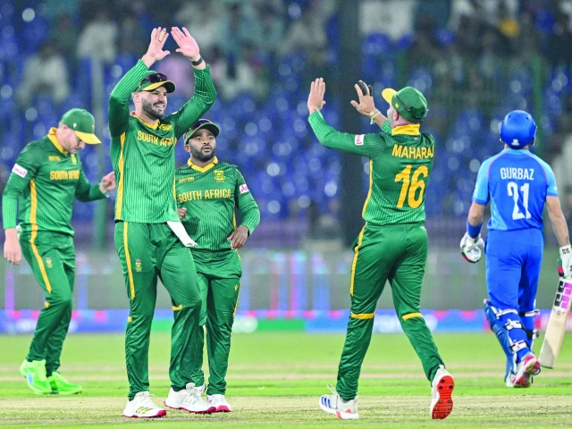 south africa s players celebrate the dismissal of afghanistan s rahmanullah gurbaz r during the icc champions trophy match at the national stadium in karachi on friday photo afp south africa s players celebrate the dismissal of afghanistan s rahmanullah gurbaz r during the icc champions trophy match at the national stadium in karachi on friday photo afp