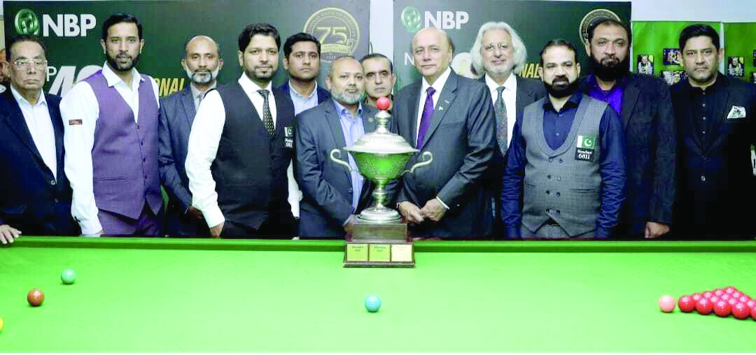 nbp svp mudassar inamullah and pbsa chairman alamgir sheikh seen with winner shahid aftab and runner up mohammad sajjad at the nbp 49th national snooker championship photo pbsa