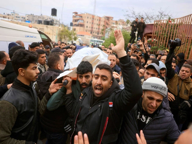 palestinian family members and colleagues carry the body of palestinian journalists killed in an israeli strike as they leave the nasser hospital for burial in khan yunis photo afp palestinian family members and colleagues carry the body of palestinian journalists killed in an israeli strike as they leave the nasser hospital for burial in khan yunis photo afp