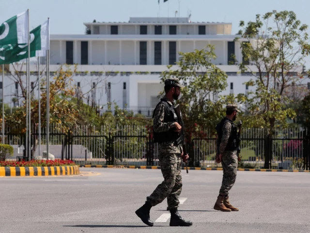 pakistani rangers patrol near the president s house as pakistan prepares to host the us and iran for peace talks in islamabad on april 10 photo reuters pakistani rangers patrol near the president s house as pakistan prepares to host the us and iran for peace talks in islamabad on april 10 photo reuters