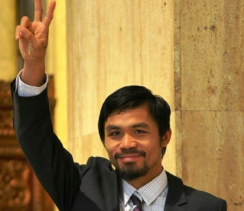 boxing pacquiao settles defamation case