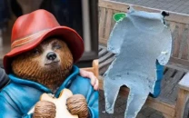 two arrested after stolen paddington bear statue recovered in newbury