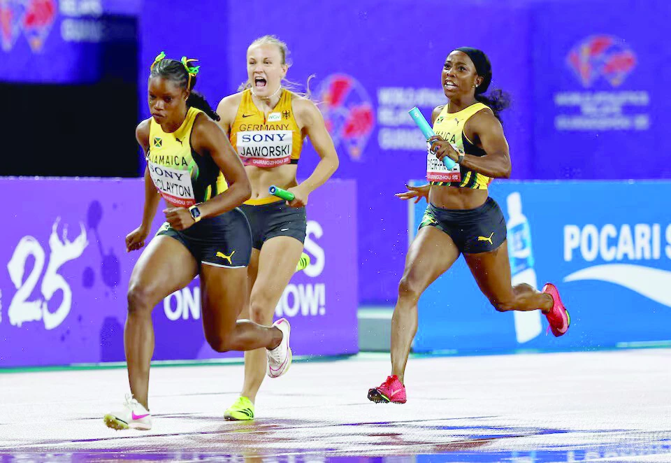 jamaica s shelly ann fraser pryce and tia clayton germany s nele jaworski in action during the women s 4x100 metres relay at guangdong olympic stadium photo reuters jamaica s shelly ann fraser pryce and tia clayton germany s nele jaworski in action during the women s 4x100 metres relay at guangdong olympic stadium photo reuters