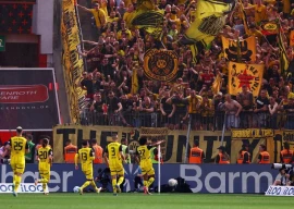 borussia dortmund s karim adeyemi celebrates after scoring their third goal during bundesliga match with leverkusen photo reuters