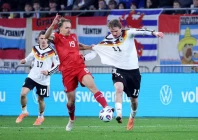 luxembourg s mathias olesen in action with germany s nick woltemade photo reuters