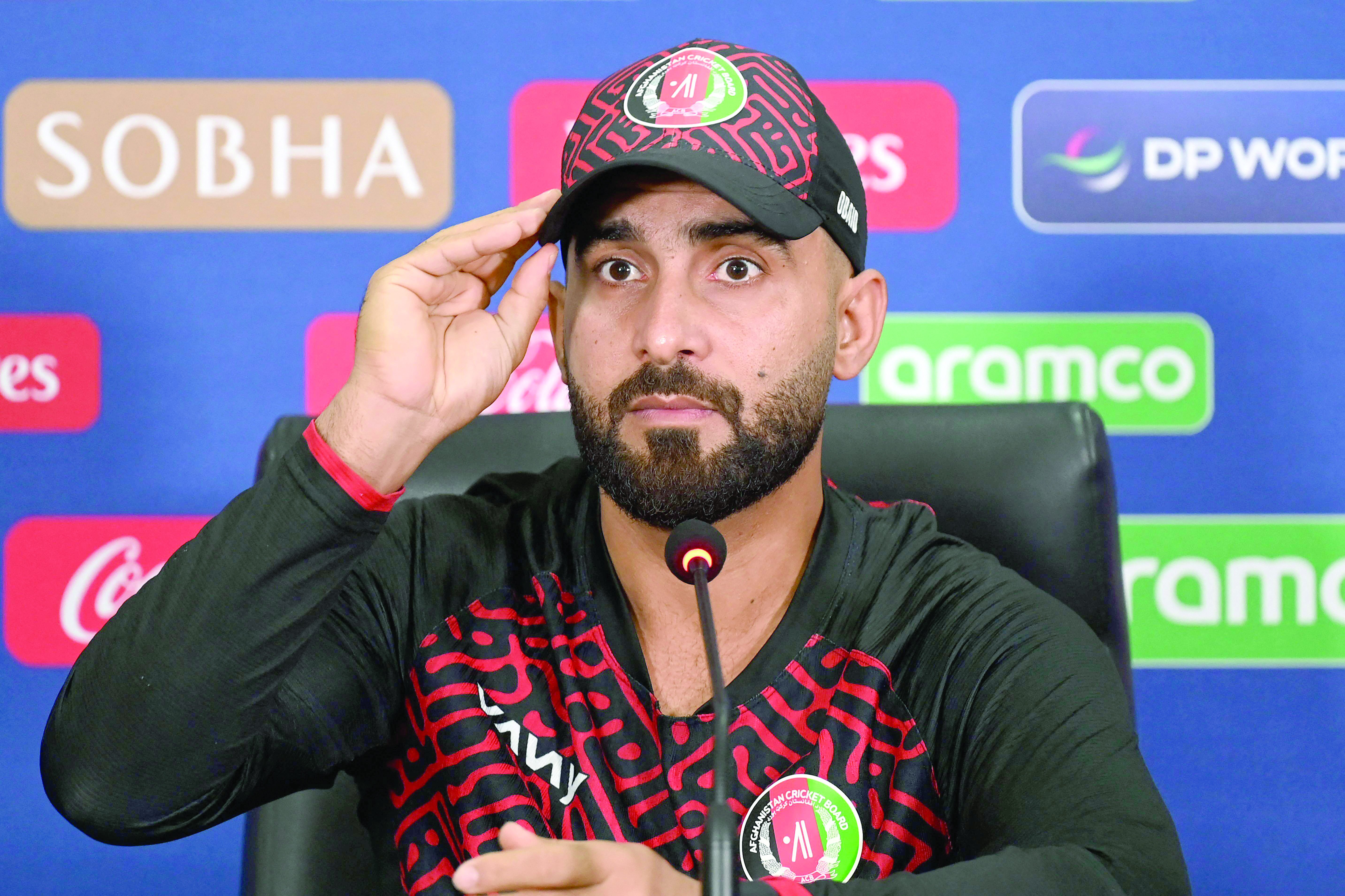 afghanistan s captain hashmatullah shahidi gestures during a press conference at the gaddafi stadium in lahore on february 25 photo afp