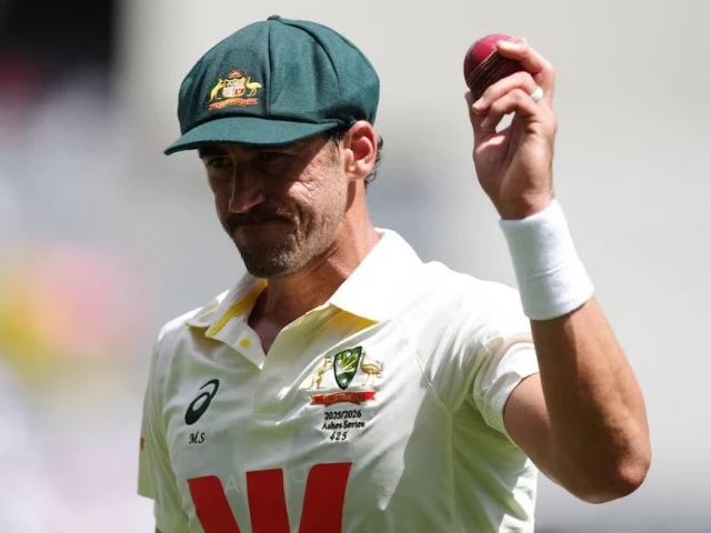australia s mitchell starc acknowledges the crowd after his seven wicket haul following the wicket of england s mark wood to end the innings caught out by alex carey photo reuters