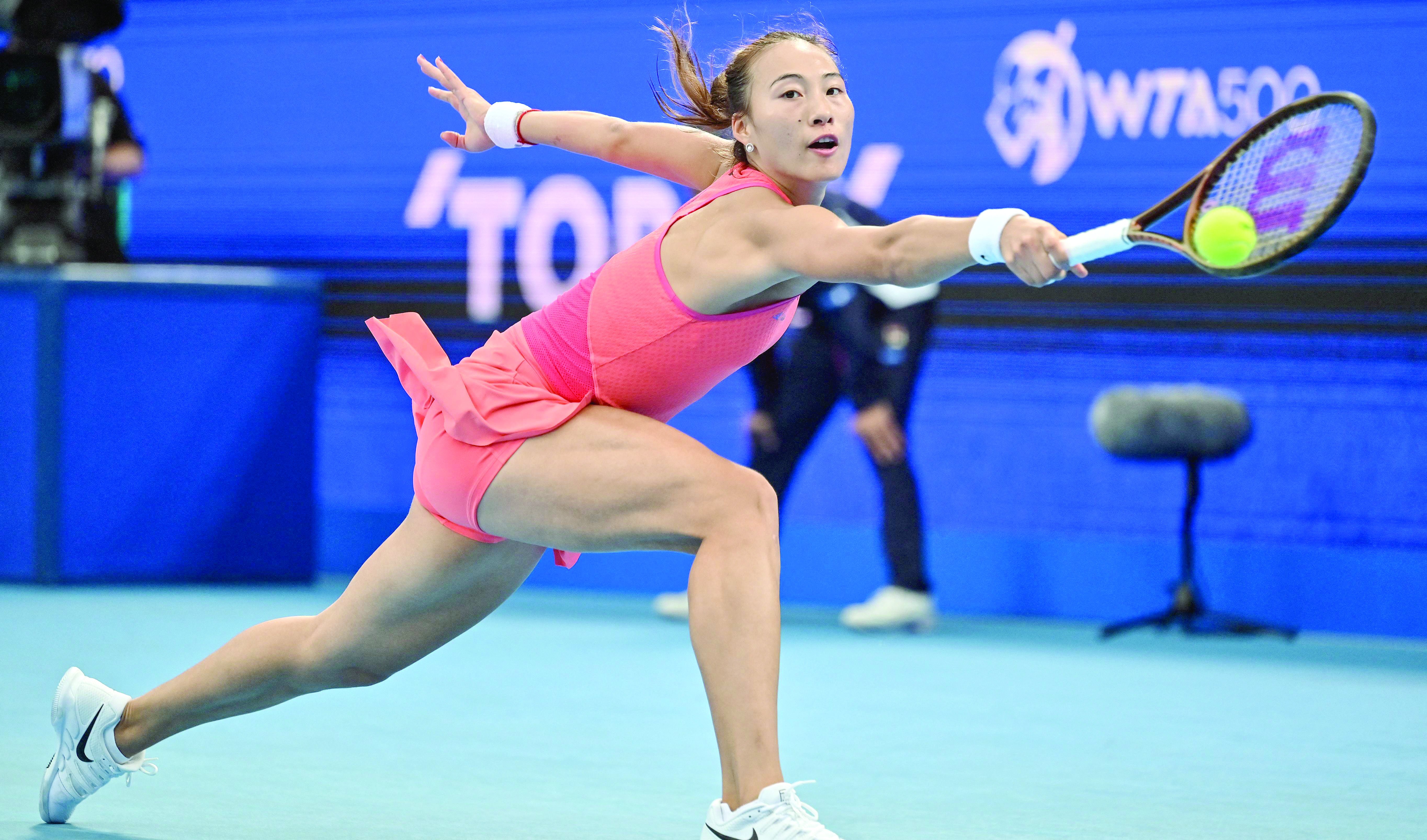 china s zheng qinwen hits a return against russia s diana shnaider during their women s singles semifinal match on day six of the pan pacific open tennis tournament in tokyo photo afp