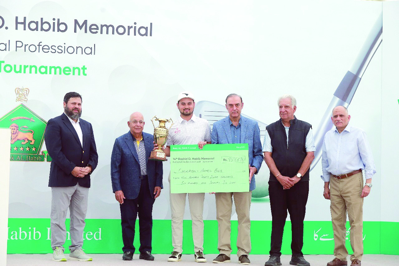 ahmed baig recieves his prize after winning the 14th rashid d habib memorial national professionals golf tournament at karachi golf club on february 9 photo courtesy organisers