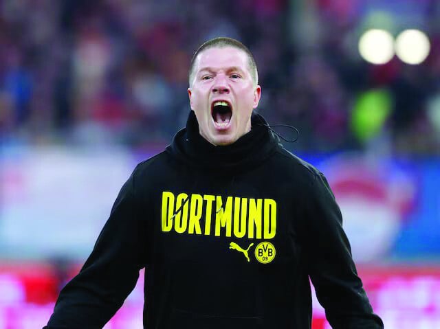 borussia dortmund interim coach mike tullberg celebrates after the match with fc heidenheim at voith arena heidenheim germany on february 1 photo reuters