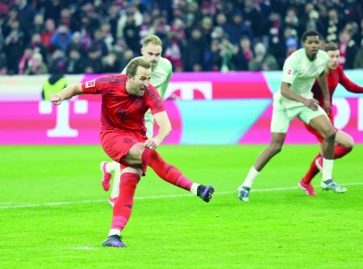 improving kane hits brace for bayern