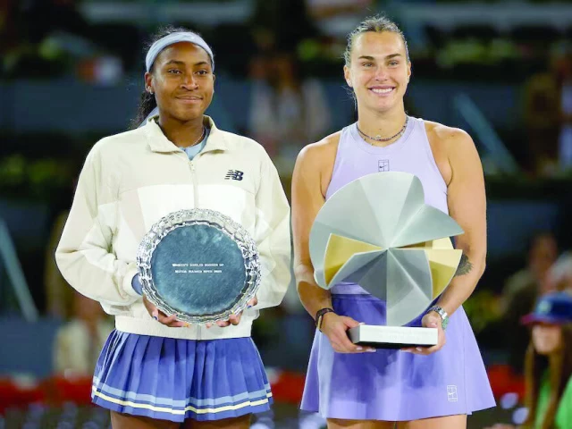 aryna sabalenka r and coco gauff l pose with the winner s and runner s up trophies after their madrid open singles final photo reuters aryna sabalenka r and coco gauff l pose with the winner s and runner s up trophies after their madrid open singles final photo reuters