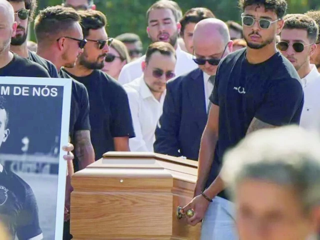 pallbearers carry the coffins of diogo jota and his brother andre silva into the church during their funeral in gondomar portugal on july 5 photo afp pallbearers carry the coffins of diogo jota and his brother andre silva into the church during their funeral in gondomar portugal on july 5 photo afp