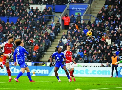 merino strikes late as arsenal sink leicester