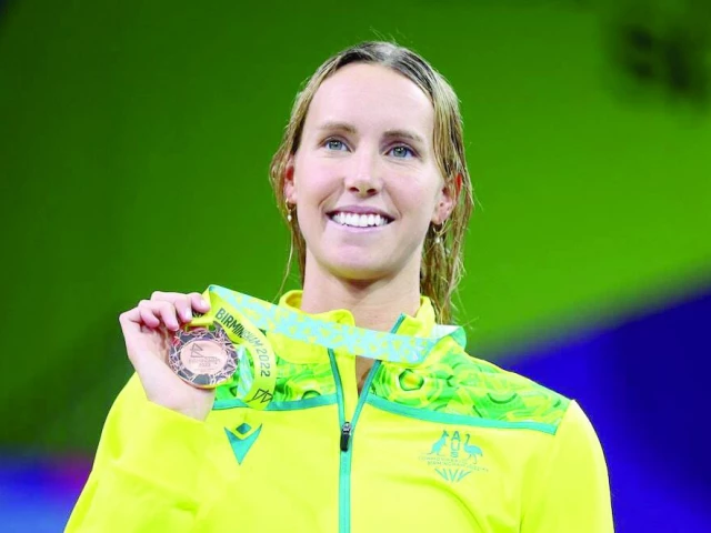 bronze medallist australia s emma mckeon celebrates on the podium during the medal ceremony of the 2022 commonwealth games women s swimming 100m freestyle medal ceremony at sandwell aquatics centre birmingham britain on august 2 2022 photo reuters bronze medallist australia s emma mckeon celebrates on the podium during the medal ceremony of the 2022 commonwealth games women s swimming 100m freestyle medal ceremony at sandwell aquatics centre birmingham britain on august 2 2022 photo reuters
