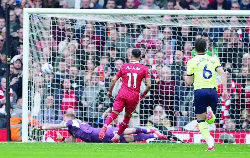 liverpool s mohamed salah scores their second goal from the penalty spot during the premier league match against southampton at anfield on march 8 photo reuters