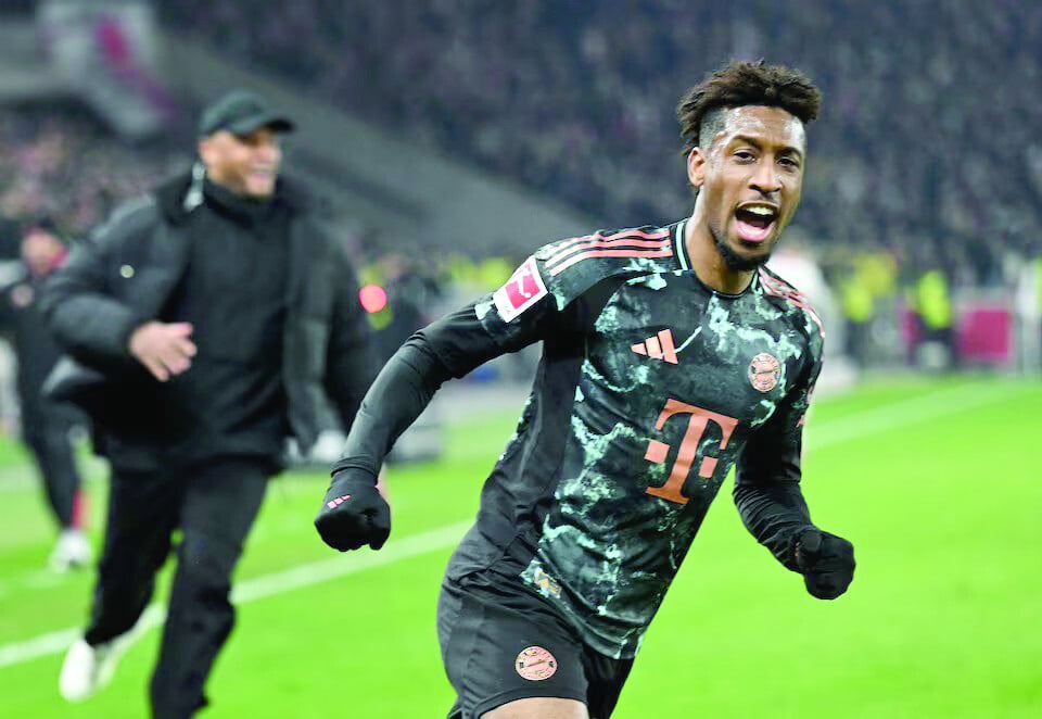 bayern munich s kingsley coman celebrates scoring their third during the bundesliga match against vfb stuttgart at mhparena stuttgart germany on february 28 photo reuters