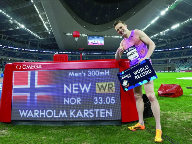 norway s karsten warholm celebrates after setting a new world record in the men s 300m hurdles at the athletics diamond league at xiamen egret stadium xiamen china on april 26 photo reuters norway s karsten warholm celebrates after setting a new world record in the men s 300m hurdles at the athletics diamond league at xiamen egret stadium xiamen china on april 26 photo reuters