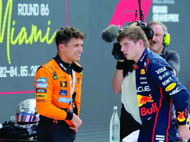 the pole position went to red bull s max verstappen r with mclaren s lando norris l second after qualifying round of formula one miami grand prix at miami international autodrome photo reuters