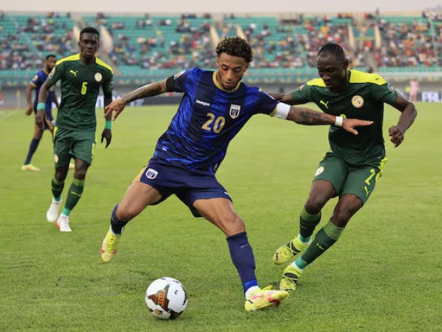 cape verde s ryan mendes in action with senegal s saliou ciss photo reuters
