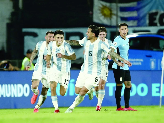 argentina s thiago almada celebrates scoring their first goal with teammates during the world cup south american qualifiers against uruguay at estadio centenario montevideo uruguay on march 21 photo reuters argentina s thiago almada celebrates scoring their first goal with teammates during the world cup south american qualifiers against uruguay at estadio centenario montevideo uruguay on march 21 photo reuters