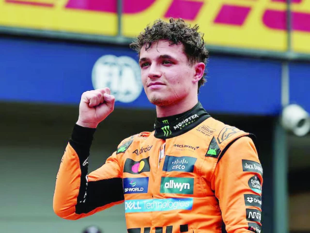 mclaren s lando norris celebrates after qualifying in pole position in the formula one australian grand prix qualifying at albert park grand prix circuit in melbourne on march 15 photo reuters mclaren s lando norris celebrates after qualifying in pole position in the formula one australian grand prix qualifying at albert park grand prix circuit in melbourne on march 15 photo reuters