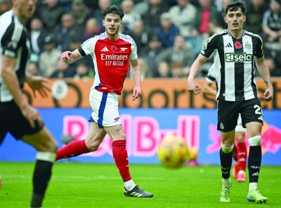 arsenal premier league hopes dented