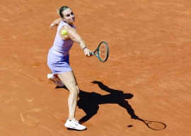 aryna sabalenka returns a ball to russia s anna blinkova during their 2025 wta tour madrid open second round match at the caja magica on april 25 photo afp