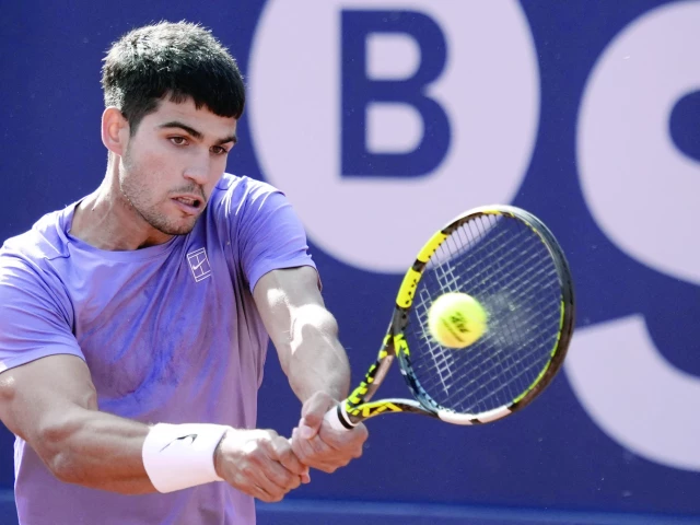 spain s carlos alcaraz returns the ball to france s arthur fils during the atp barcelona open conde de godo tennis tournament singles semi final match at the real club de tenis in barcelona on april 19 photo afp spain s carlos alcaraz returns the ball to france s arthur fils during the atp barcelona open conde de godo tennis tournament singles semi final match at the real club de tenis in barcelona on april 19 photo afp