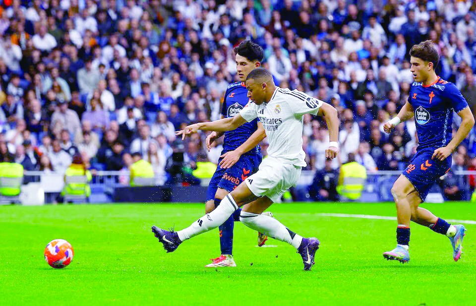 real madrid s kylian mbappe scores their third goal during the laliga match with celta vigo at santiago bernabeu madrid photo reuters real madrid s kylian mbappe scores their third goal during the laliga match with celta vigo at santiago bernabeu madrid photo reuters