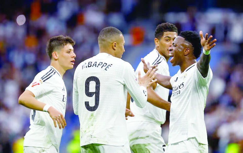 real madrid s kylian mbappe celebrates scoring their second goal with teammates jude bellingham arda guler and vinicius junior during laliga match with celta vigo on may 4 photo reuters real madrid s kylian mbappe celebrates scoring their second goal with teammates jude bellingham arda guler and vinicius junior during laliga match with celta vigo on may 4 photo reuters