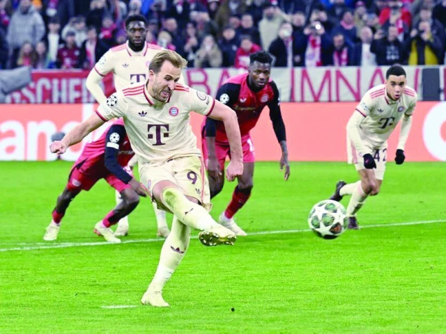 bayern munich s harry kane scores a goal from the penalty spot during champions league round of 16 first leg against bayer leverkusen on march 5 photo reuters bayern munich s harry kane scores a goal from the penalty spot during champions league round of 16 first leg against bayer leverkusen on march 5 photo reuters