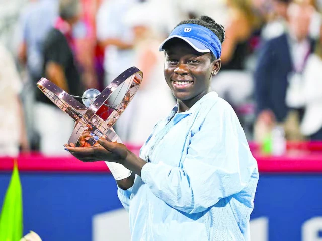 victoria mboko canada tournament winner against naomi osaka japan holds her trophy at iga stadium photo david kirouac reuters victoria mboko canada tournament winner against naomi osaka japan holds her trophy at iga stadium photo david kirouac reuters