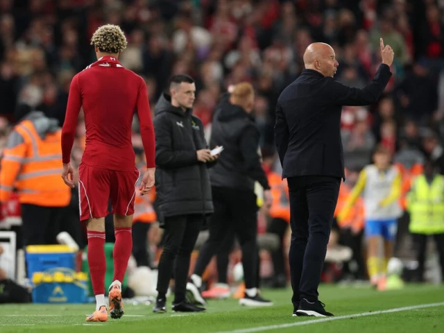 liverpool s hugo ekitike walks past manager arne slot after being sent off photo reuters liverpool s hugo ekitike walks past manager arne slot after being sent off photo reuters