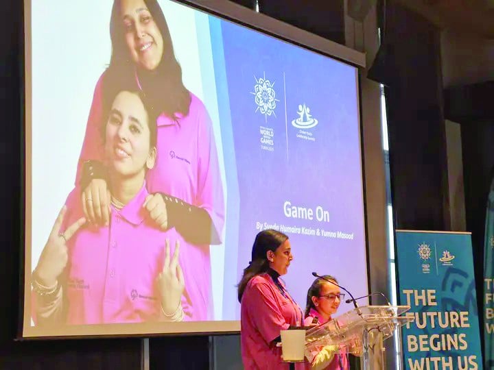 special olympics pakistan youth leaders and the global youth leadership council members syeda humaira kazim and yumna masoid on the stage leading the first session of the 25th global youth leadership summit on the sidelines of the special olympics world winter games in turin photo courtesy sop