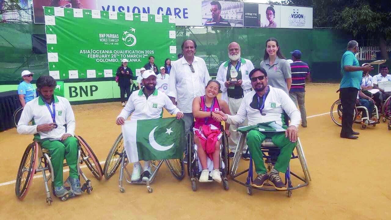 pakistan wheelchair tennis team pose for a picture after receiving their bronze medals photo courtesy ptf