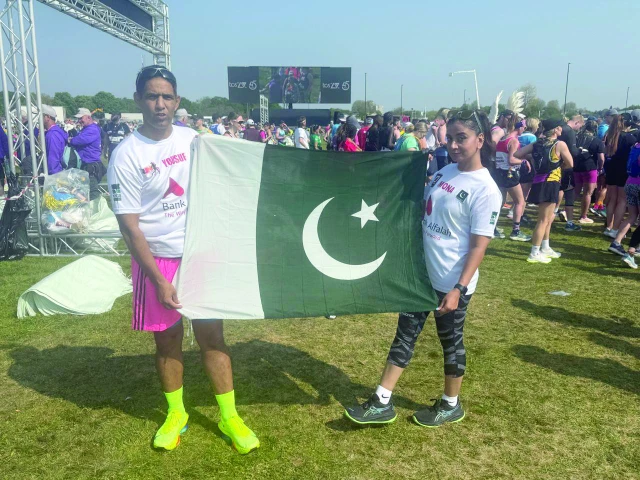 the first pakistani female journalist mona khan poses for a picture with her coach muhammad yousuf as they completed london marathon against all odds photo courtesy pr the first pakistani female journalist mona khan poses for a picture with her coach muhammad yousuf as they completed london marathon against all odds photo courtesy pr