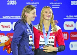 ledecky reigns over mcintosh