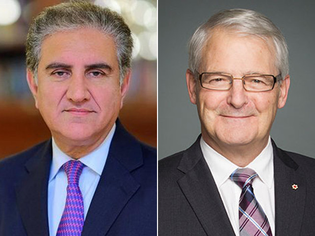 fm qureshi and his canadian counterpart marc garneau photo file