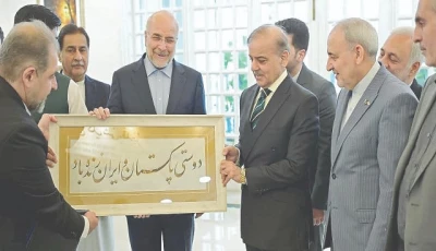 iran s islamic consultative assembly speaker dr mohammad bagher ghalibaf presents a memento to prime minister shehbaz sharif photo nni