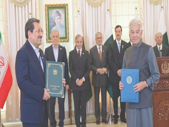 prime minister shehbaz sharif iranian president dr massud pezeshkian and other dignitaries witness the signing ceremony of various mous and agreements between the two countries photo express prime minister shehbaz sharif iranian president dr massud pezeshkian and other dignitaries witness the signing ceremony of various mous and agreements between the two countries photo express
