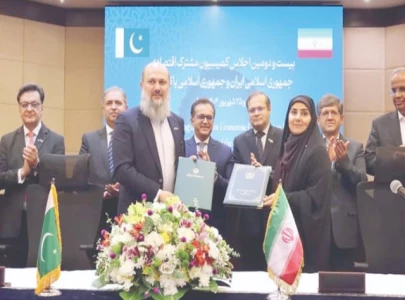 pakistan iran ink trade deals