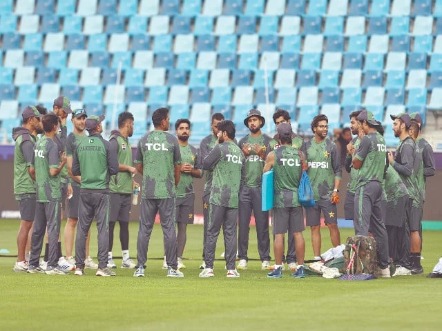 pakistan cricket team players huddle during a practice session at the dubai international stadium in dubai photo afp pakistan cricket team players huddle during a practice session at the dubai international stadium in dubai photo afp