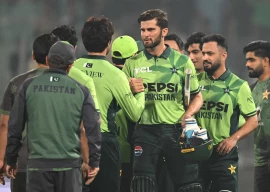 pakistan s captain shaheen shah afridi c celebrates with teammates at the end of the first one day international odi cricket match against south africa at the iqbal stadium in faisalabad on november 4 photo afp